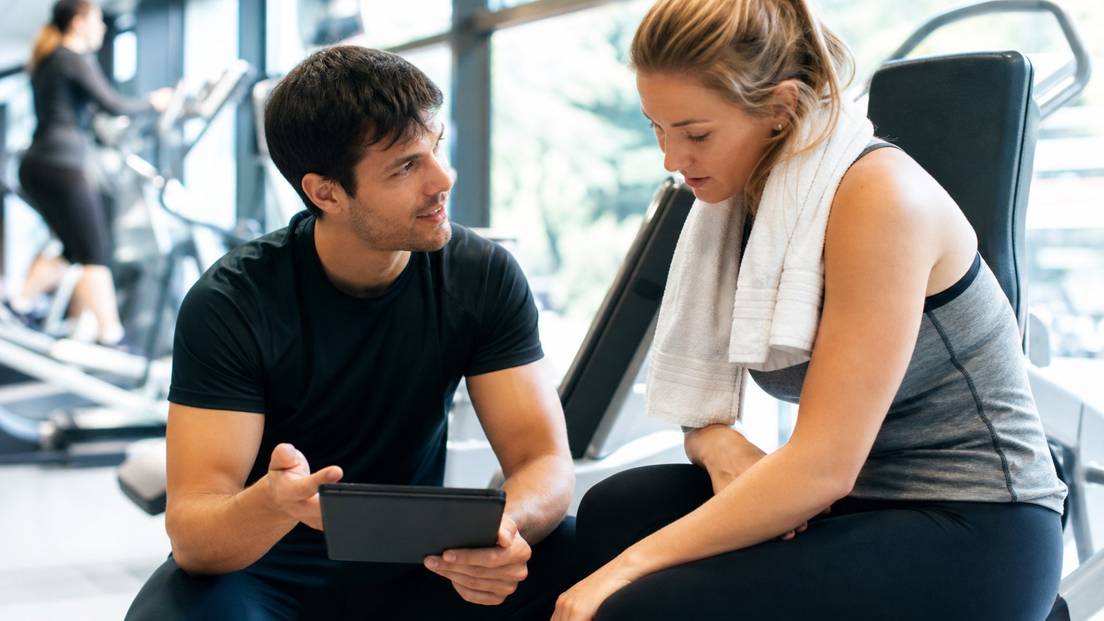 Coach proposant le renouvellement d'un forfait à son client
